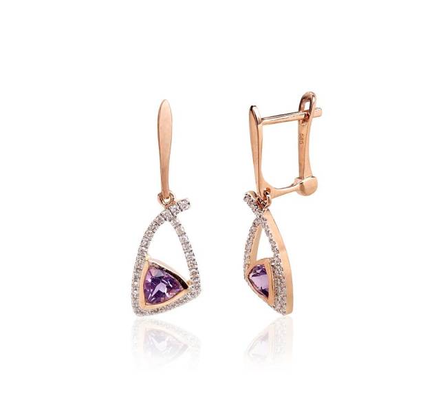 Auksiniai auskarai ant cilindrinės spynos0