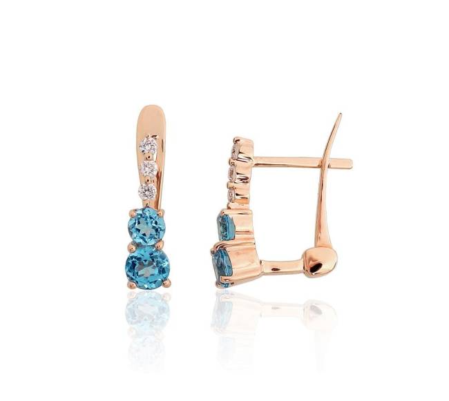 Auksiniai auskarai ant cilindrinės spynos0