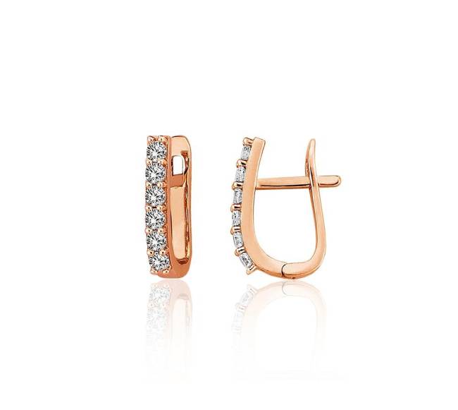 Auksiniai auskarai ant cilindrinės spynos0